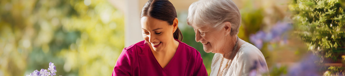 Elderly woman receiving live-in care and companionship from caregiver in Texas